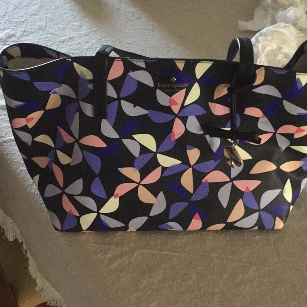 Kate Spade multi color bag use twice .